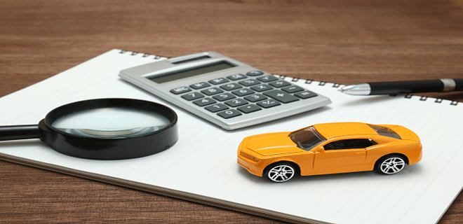 Whom will the insurers pay the claim if there is an outstanding loan on the car?